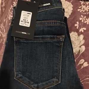 Navy blue ripped skinny jeans from fashion nova